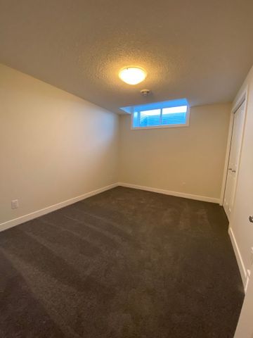 Brand-New 2 Bedroom Basement Suite in Wolf Willow – Private Entrance - Photo 5