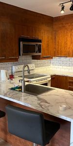 À louer (disponible immédiatement): Grand condo de 3 ½ semi-meublé à Laval - Photo 3