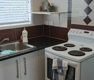 Beaufully presented two bedroom unit with a garage - Photo 3