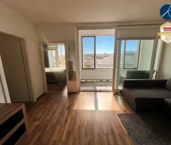 Neuwertige 2-Zimmer Wohnung mit 2 Loggien und Auto-Stellplatz - Foto 1