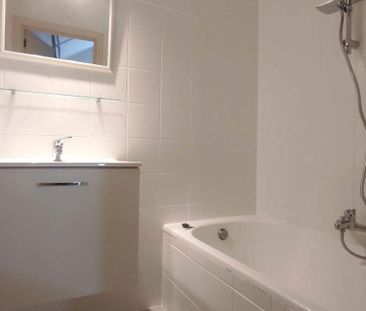 Duplex te huur in Mons voor € 675 met 1 slaapkamer - Photo 4