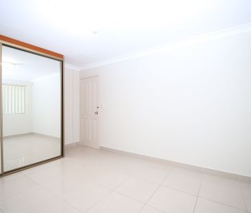 Freshly Painted 2 bedroom unit - Photo 4