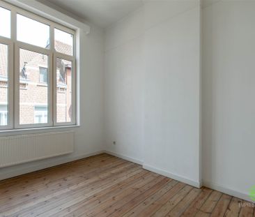 Karaktervolle gezinswoning met 3 slpk en stadstuin, in het centrum! - Photo 2