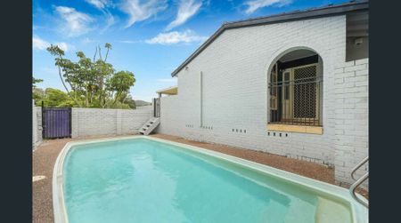 Charming Family Home with Pool and Entertainment Deck in Ideal Location - Photo 3