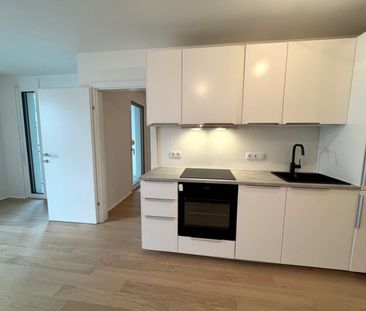 2-Zimmer-Erstbezug mit Loggia und Gartenblick – Toplage bei U1 Kagr... - Photo 2