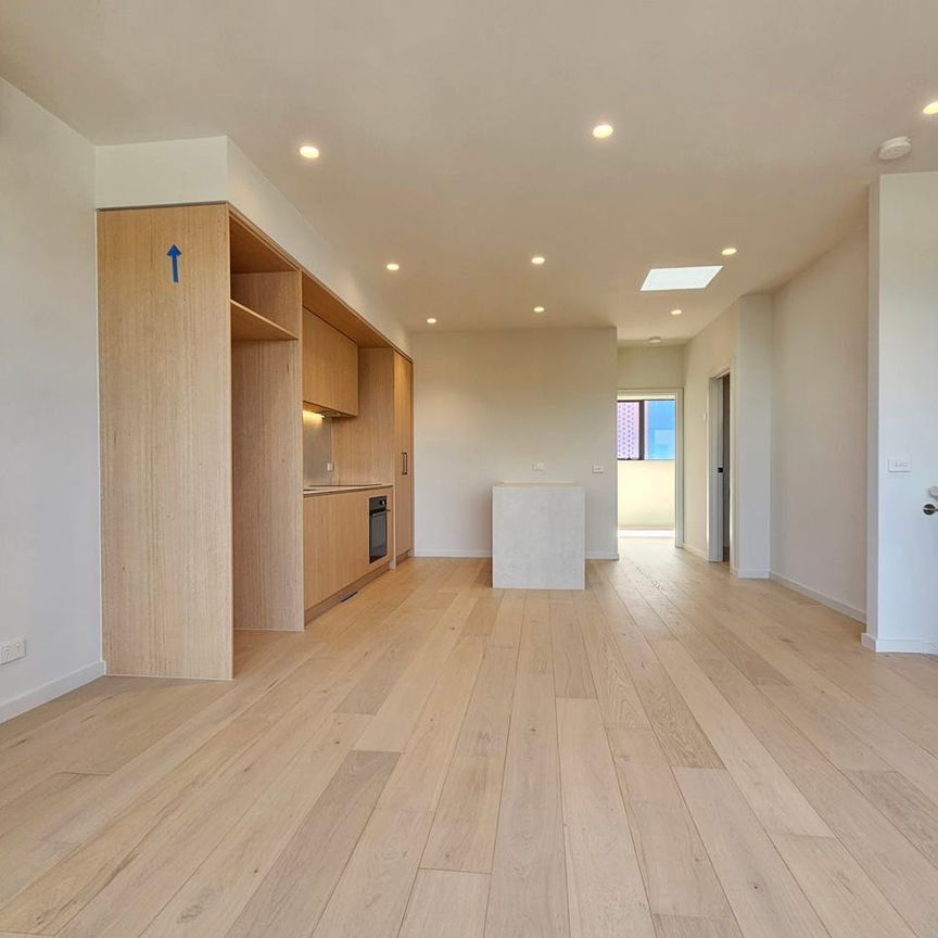 BRAND NEW MODERN TOWNHOUSE WITH BALCONY AND 2 CAR PARKING - Photo 1