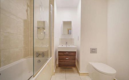 Contemporary Two-Bedroom Apartment with Balcony and Secure Parking - Photo 3