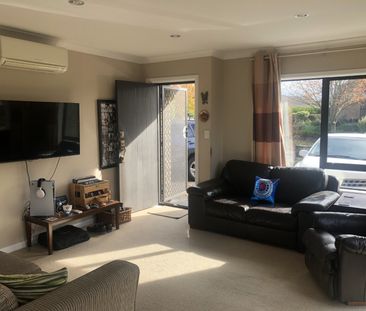 This modern and warm two-bedroom unit is positioned in a quiet cul-... - Photo 2