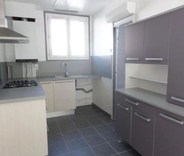 Appartement à louer 4 pièces 64m² - Photo 2