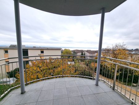 Joli appartement de 3 pièces au 1er étage avec balcon et vue sur le lac situé dans un quartier calme - Photo 3