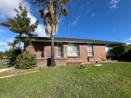 Peaceful Suburban Living in a Central, Well-Connected Location - Photo 2
