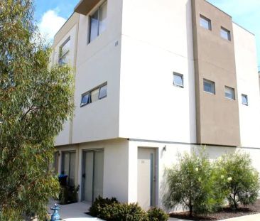 “Bright, Fresh, Stunning Townhouse with Open Plan living!” - Photo 1
