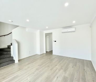 Contemporary 4-Bedroom Family Home Overlooking Park & Waterway - Photo 1