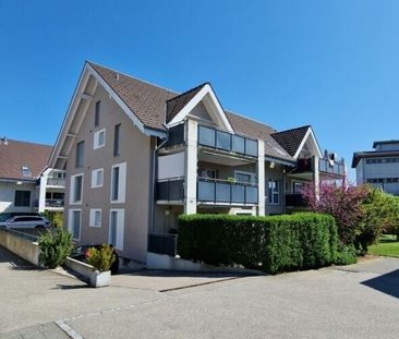 Appartement de 4,5 pièces au rez-de-chaussée - Photo 2