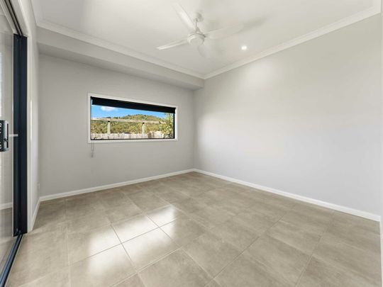 Spacious Family Home with Huge Entertaining Deck + Media Room in Brookhaven! - Photo 1