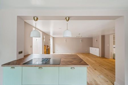 This beautifully converted former school house has been finished to an exceptional standard, seamlessly blending period character with contemporary design. - Photo 4