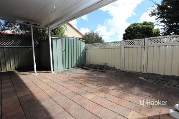 Quality Unit in Convenient Setting - Photo 1