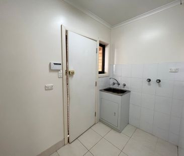 4 Bedroom Home with Extra Parking - 6 Month Lease to start - Photo 3