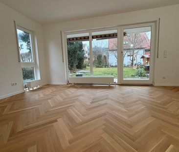 Helle 2-Zimmer Wohnung mit priv. Garten, Hobbyraum und Carport - Foto 1