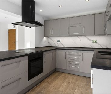 A detached three bedroom bungalow with a garage and driveway parkin... - Photo 5