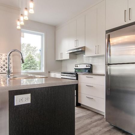 MAGNIFIQUE appartement style condo 4 1/2 sur le golf de VALLEYFIELD - Photo 4