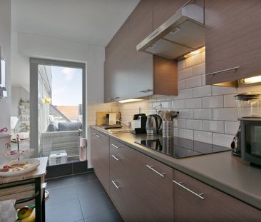 Dakappartement met ruim zuidgeoriënteerd terras! - Photo 2