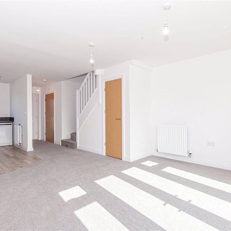 A recently built two-bedroom house featuring a private garden and driveway parking. - Photo 1