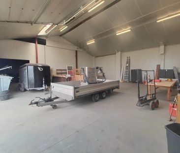 Geïsoleerde loods van 385m² met sectionaalpoort - foto 1