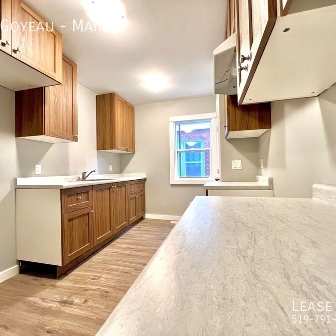 Completely Renovated 4 Bedroom 1 Bathroom Main Floor Unit - Photo 1