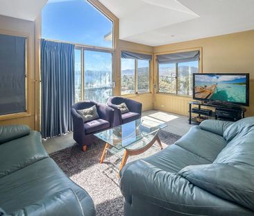 4 Bedroom 2 Bathroom Unit with a 2 Car Garage - Photo 1