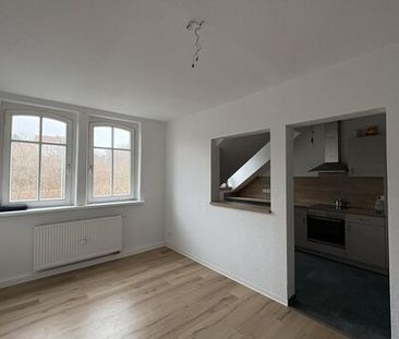 Zentral gelegene Dachgeschosswohnung mit Einbauküche in Zwickau - Photo 1