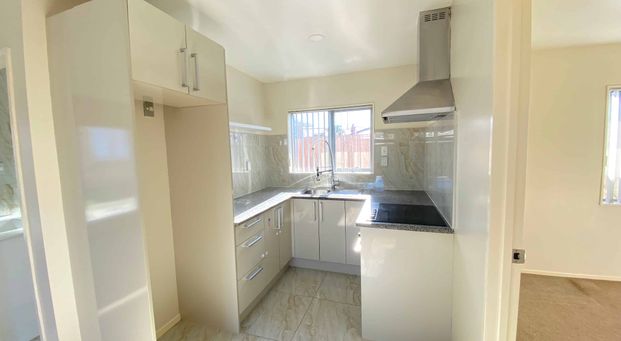 Brand-New 2-Bedroom Unit - Photo 1