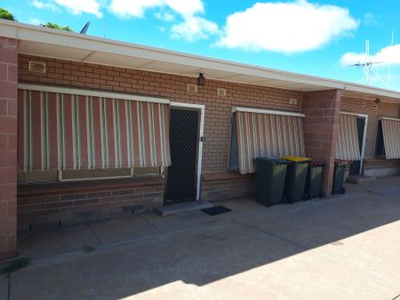 Neat and Tidy unit with own private rear paved courtyard - Photo 2