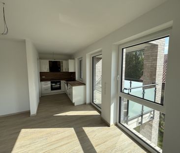 Erstbezug - Moderne Obergeschosswohnung im Zentrum von Wiefelstede - Foto 1