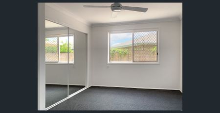 Duplex with HUGE backyard! - Photo 3