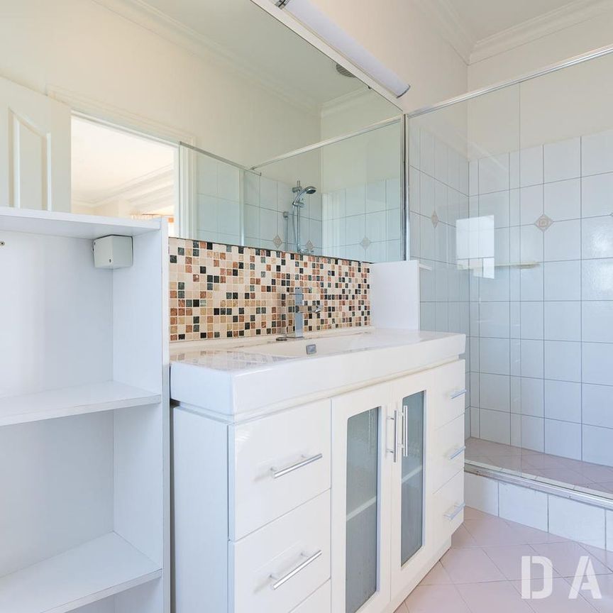 Fall in Love with This Stunning 4-Bedroom Coastal Retreat! - Photo 1