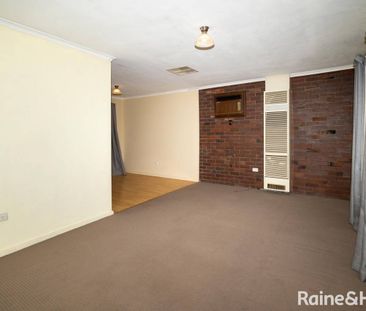 VERSATILE LAKE ALBERT HOME WITH SHEDS AND STUDY - Photo 1