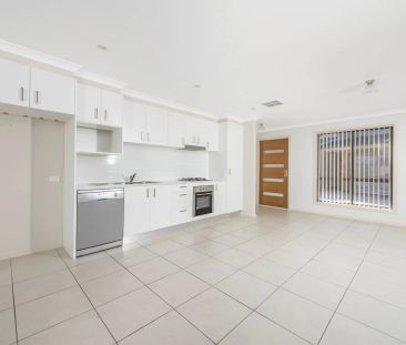 Single Level Townhouse with Lock up Garage - Photo 4