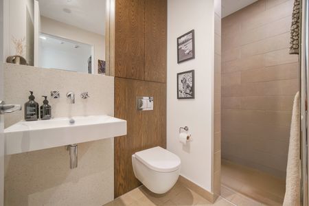 Stylish City-Fringe Apartment with Huge Private Deck - Photo 2