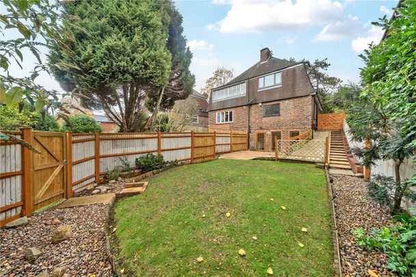 An attractive family home in an ideal location for town, schools and station. - Photo 1