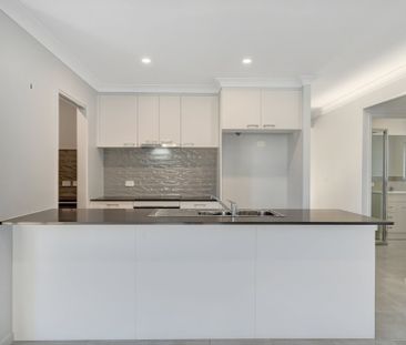 Modern Family Home with Pool in Prime Mount Low Location - Photo 6