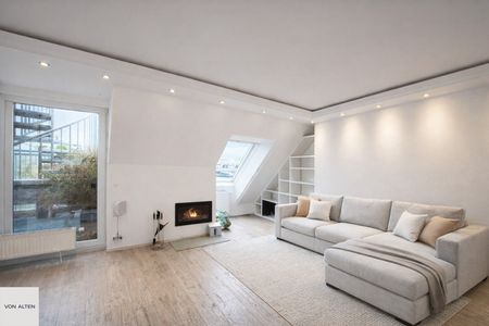 Maisonette-Dachgeschosswohnung mit Lift auf beiden Ebenen, großzügigen Terrassenflächen & Tiefgaragenplatz - Photo 5