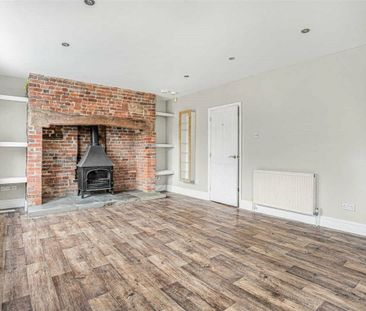 A detached four bedroom family home with outbuildings and off-stree... - Photo 2