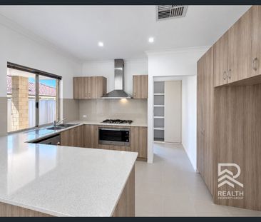 Modern 3-Bedroom Home with Theatre Room in Cannington - Photo 6