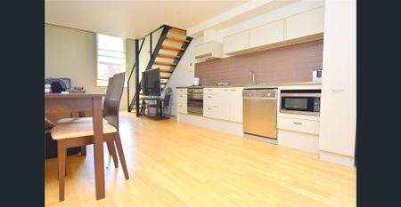 Furnished Loft-Style Living in the Heart of the CBD - Photo 4