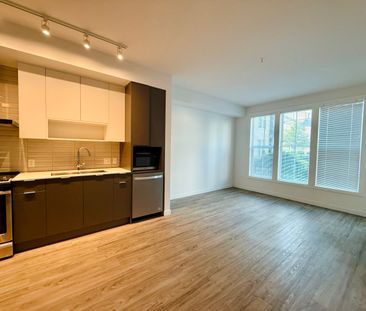 1 Bdrm + Den at Central Green w/ Patio & Greenspace - Photo 4