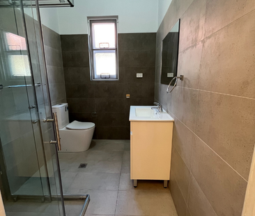 MOVE-IN READY STUDIO WITH MODERN KITCHEN AND NATURAL LIGHT - Photo 5
