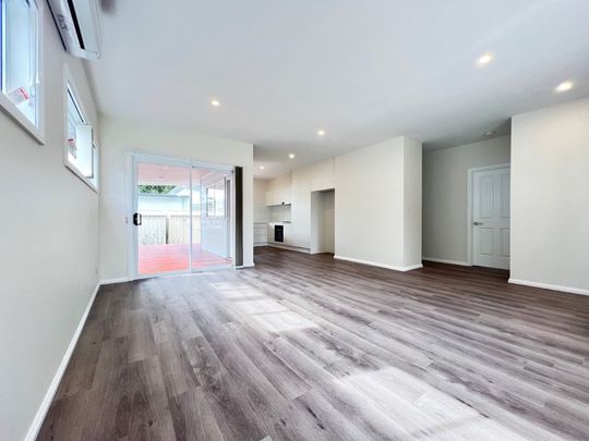 Fully Renovated Family Home with Air Conditioning - Photo 1