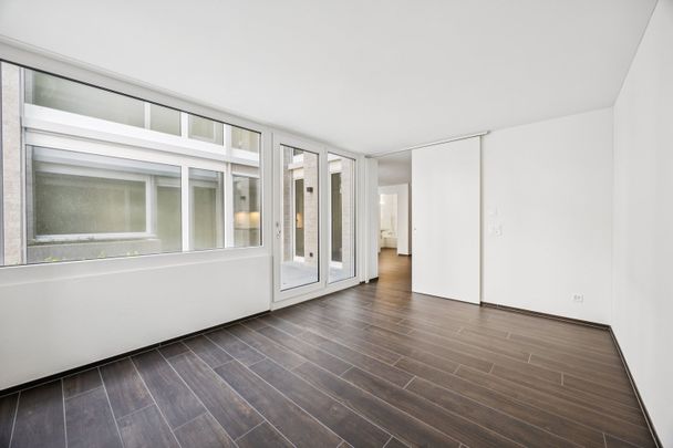 ERSTVERMIETUNG: Moderne Split-Level-Wohnung mit Charme in Zürich-Oerlikon - Photo 1