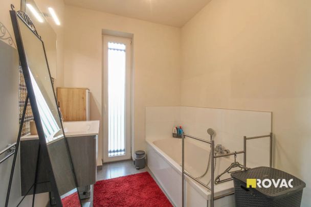 Gelijkvloers appartement met tuin en garage! - Photo 1